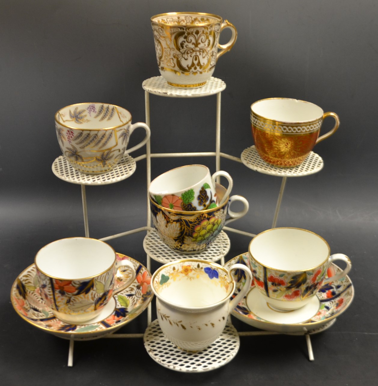 Early 19th century   Spode cups and saucers in Imari  palette; Coalport cups; Newhall cup, etc.