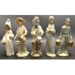 A Lladro figure Dutch milk carrier; others fisher boy,