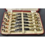 A set of six Royal Crown Derby Imari pattern pistol knives and forks,