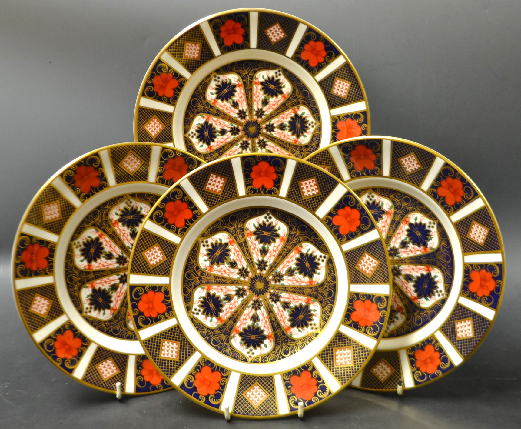 A set of four Royal Crown Derby 1128 pattern dessert plates,