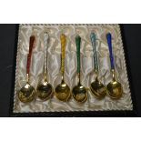 A set of six cased Danish enamel teaspoons