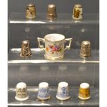 Thimbles -  on Indian silver and floral,