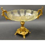 An early 20th century gilt metal and clear glass table centrepiece,