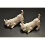 A pair of Royal Copenhagen pottery models west highland terrier and slipper,