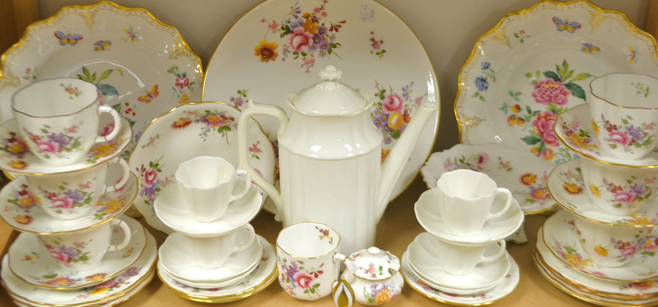 A Royal Crown Derby Posie tea service comprising, six side plates,