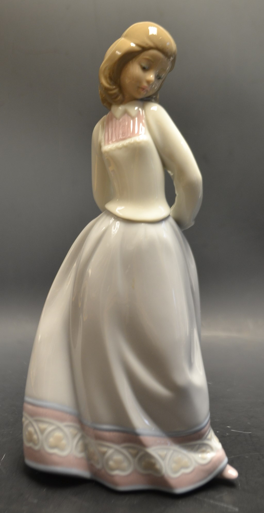 A Lladro figure Sweet and Shy (06754), boxed,certificate.