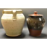 A large stoneware studio pottery three handled jar and cover,