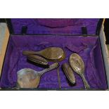 A silver backed brush and mirror Set, Birmingham; another silver backed brush ,