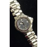 A Baume and Mercier Formula S lady's quartz wrist watch, Model No MV04FO32, black dial,