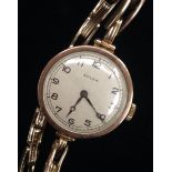 Rolex - A 1930's lady's 9ct gold cased circular wrist watch, silvered dial, Arabic numerals,