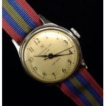 An Ingersoll Ltd London "Triumph" steel case wristwatch, cream dial, Arabic numerals,