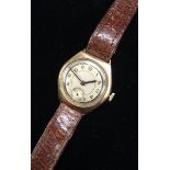 A Vintage 1930's Stolkace 9ct gold gentleman's wristwatch, silvered dial, Arabic numerals,