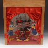 Walt Disney - a  theatre type animated display unit with five Pelham puppets,