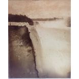 An early 20th century sepia photograph of the Niagara Falls, taken by Geo.