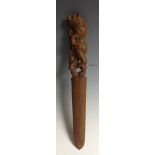 A Black Forest novelty page turner, the handle carved as a bear with a hunting rifle,