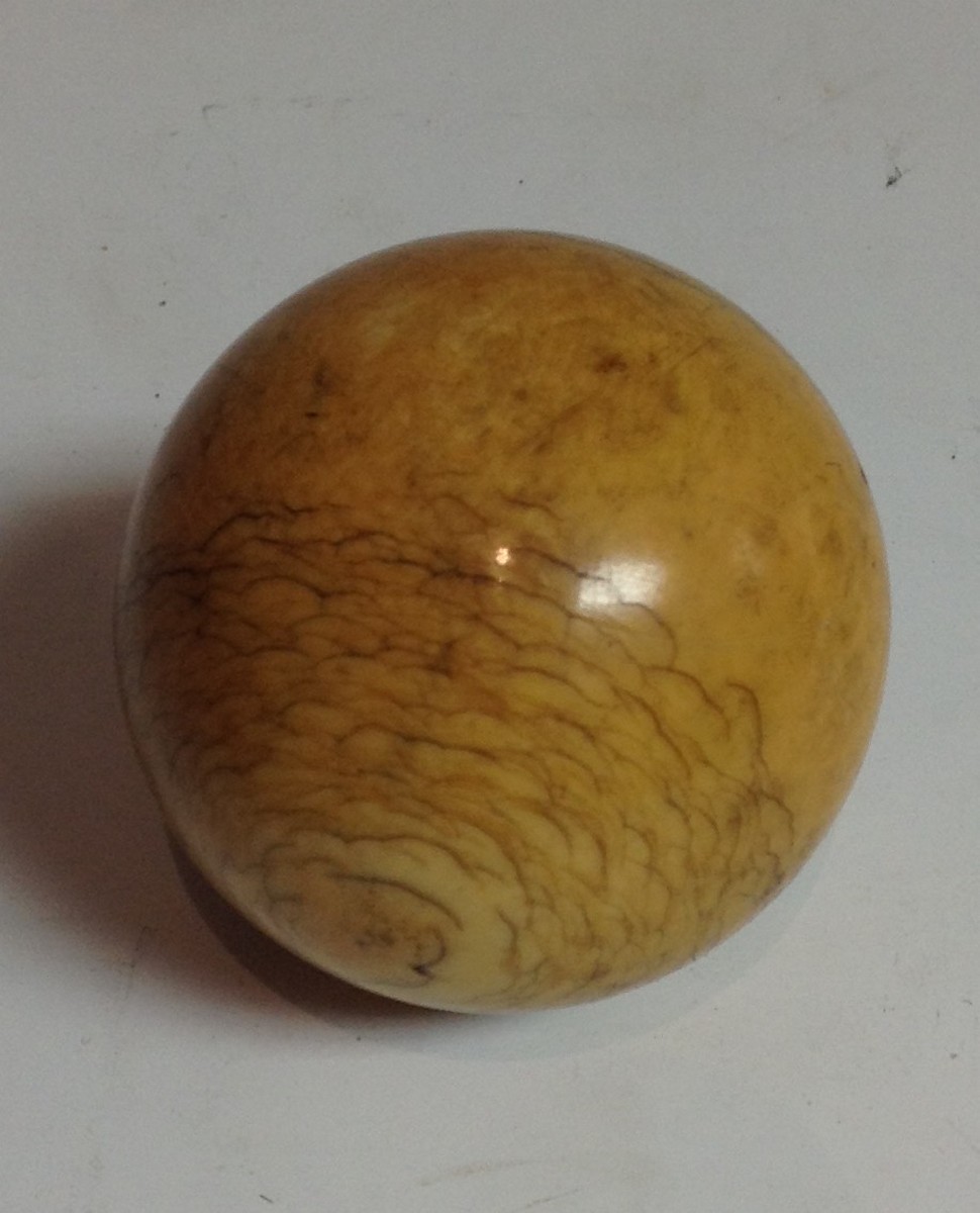 A 19th century ivory billiard ball, of typical form,