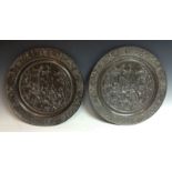 A pair of bronzed Grand Tour circular plaques, after the original by Hans Jakob Bayr (1574-1628),