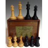 A boxwood and ebony chess set, by J Jaques & Son Ltd, the rooks marked for king's side,