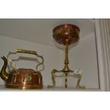 An early 20th century copper and brass tea kettle on stand, applied with bosses, c.