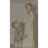 A Lladro figure, Teaching to Pray, 4779, discontinued 1998,