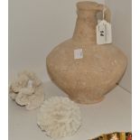 An early stoneware small flagon, loop handle, 20cm high;  a coral reef;  another,
