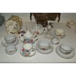 Ceramics - a miniature tea service, painted with flowers, comprising teapot, sugar bowl,