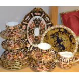 A Royal Crown Derby Imari 2451 tea service comprising, three tea plates four side plates,