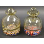 A  pair of 19th century millefiori ink bottles, the bases set with coloured concentric canes,