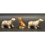 A pair of Royal Crown Derby polar bear clubs standing paperweights;