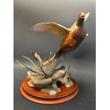 A Franklin Mint figure, The Ring Necked Pheasant by A.J.