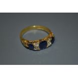 A seven stone sapphire and diamond ring,