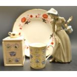 A Royal Crown Derby Bali pattern 27cm plate ; a Ringtons tea caddy ; a Spanish figure of a woman.