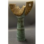 A Clive Brooker studio pottery vase, in tones of turquoise blue and green,