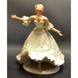 A Wallendorf figure of a lady dancing.