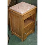 A mid 20th century French fruitwood farmhouse bedside cabinet with marble top