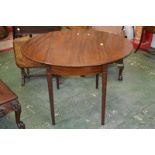 A George III mahogany Pembroke table, moulded oval top, single drawer to frieze,