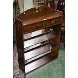 Art Deco oak bookcase with shaped top and two drawers