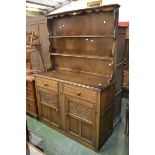 A Hoskins Knight Brand oak dresser, two shelves to top,