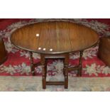 An Old Charm oak dropleaf occasional table