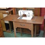 A table sewing machine.