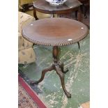 An Edwardian mahogany two tier occasional table circa 1910