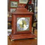 A 1980's West German reproduction chiming bracket clock, silvered and gild dial,