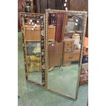 A gilt framed rectangular wall mirror; another, japanned frame decorated with flora.