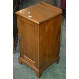 An ash bedside cabinet, galleried top,