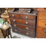 An early to mid 19th century chest of oak drawers, two short over three long graduated drawers, c.