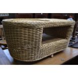 A contemporary wickerwork conservatory coffee table,