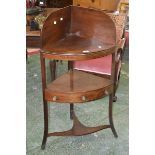 An Edwardian mahogany corner washstand, galleried top with removable cover,