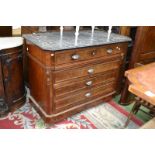 A French escritoire chest, marble top, canted angles, the top drawer opening to fitted interior,