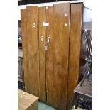 A Ros Bros Furniture walnut double wardrobe.