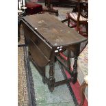 A George III oak gateleg table, c.